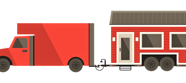 Building a house for 50K or less tiny home being towed by truck